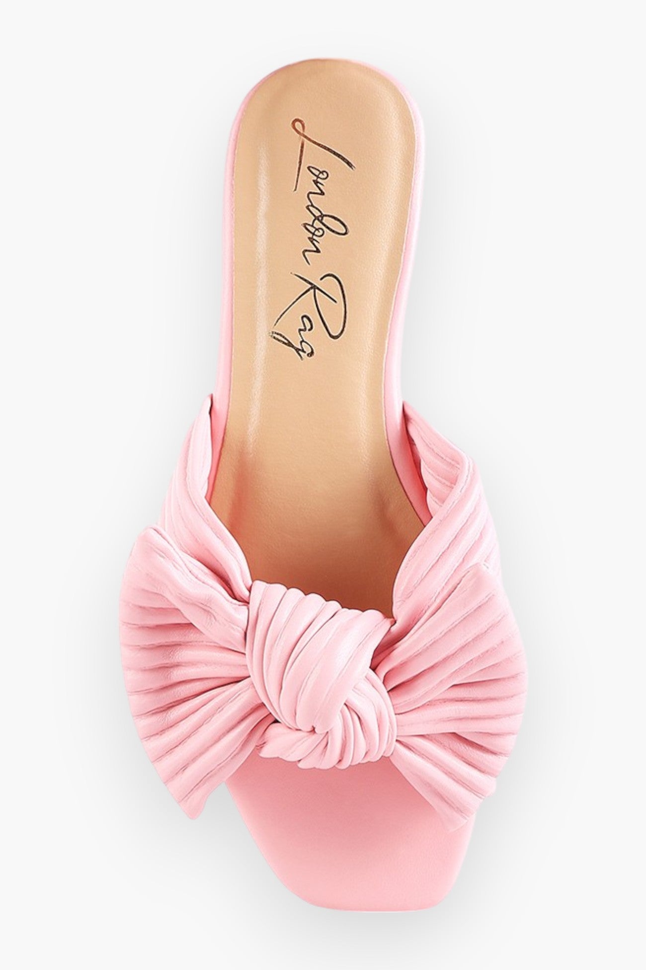 Top view of pink textured bow slide flats from L. Mae Boutique, showcasing a knotted bow design and soft PU material.