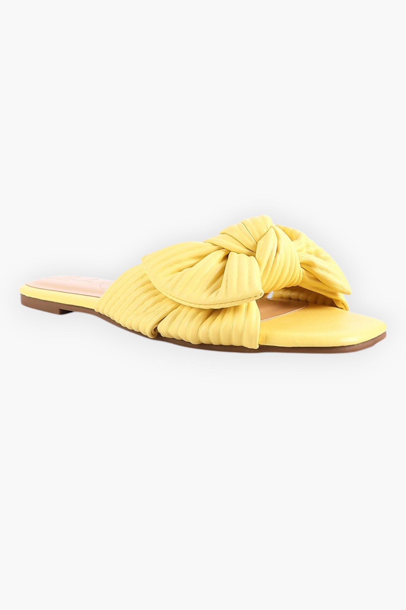 Yellow textured bow slide flats from L. Mae Boutique, designed with a pleated bow accent and cushioned footbed for all-day wear.