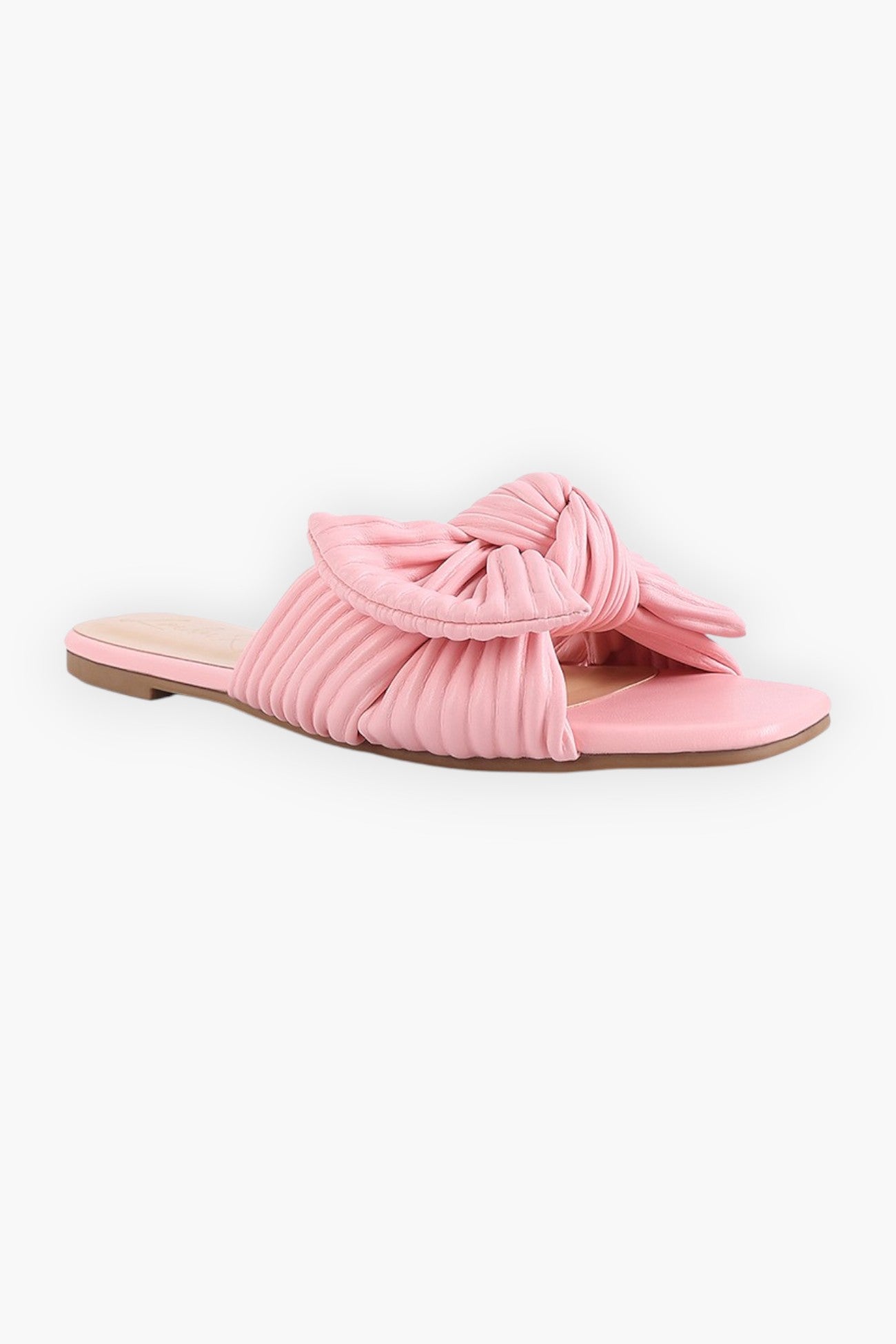 Pink textured bow slide flats from L. Mae Boutique, featuring a pleated bow detail and cushioned insole for stylish comfort.