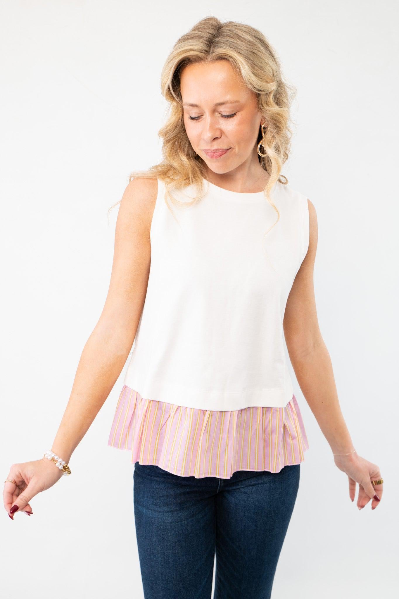 Sleeveless white tank top with a pink and yellow striped pleated hem, adding a chic and breezy touch to casual outfits.