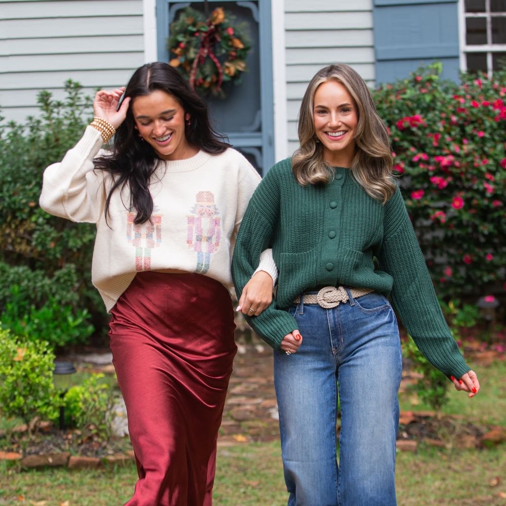 Christmas and holiday festive knit sweaters with nutcrackers and red and green patterns