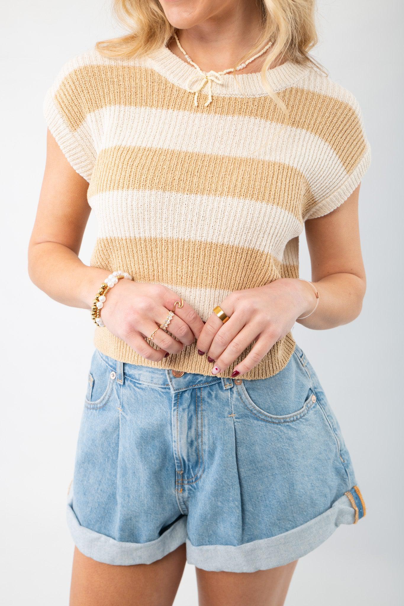 Close-up of the Tyler Taupe Striped Knit Cropped Vest, showcasing its soft knit texture and stylish striped pattern.