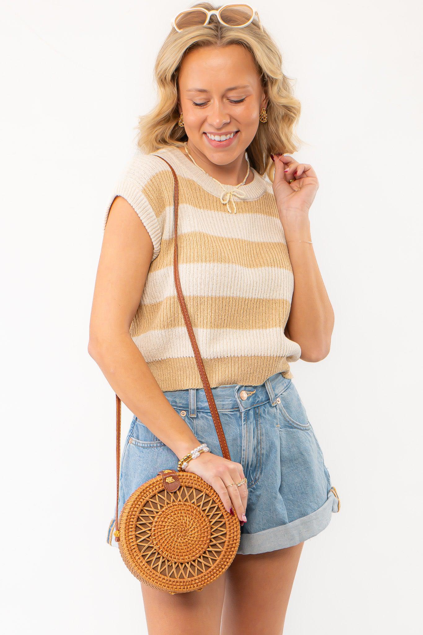 Tyler Taupe Striped Knit Cropped Vest styled with denim shorts and a woven bag, perfect for a casual spring look.