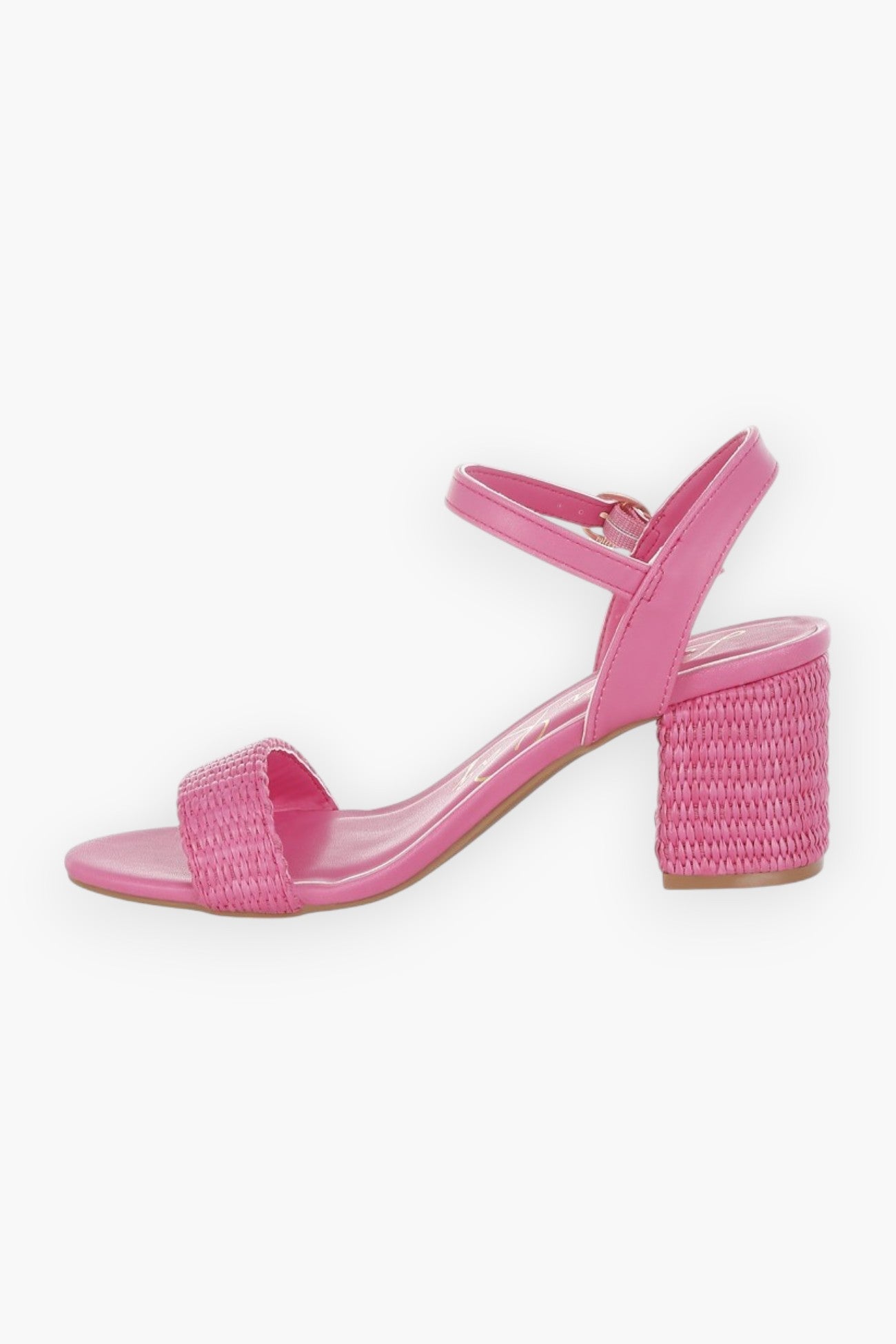 Side view of pink raffia block heel sandals featuring a woven raffia heel and sleek ankle strap for a stylish summer look.