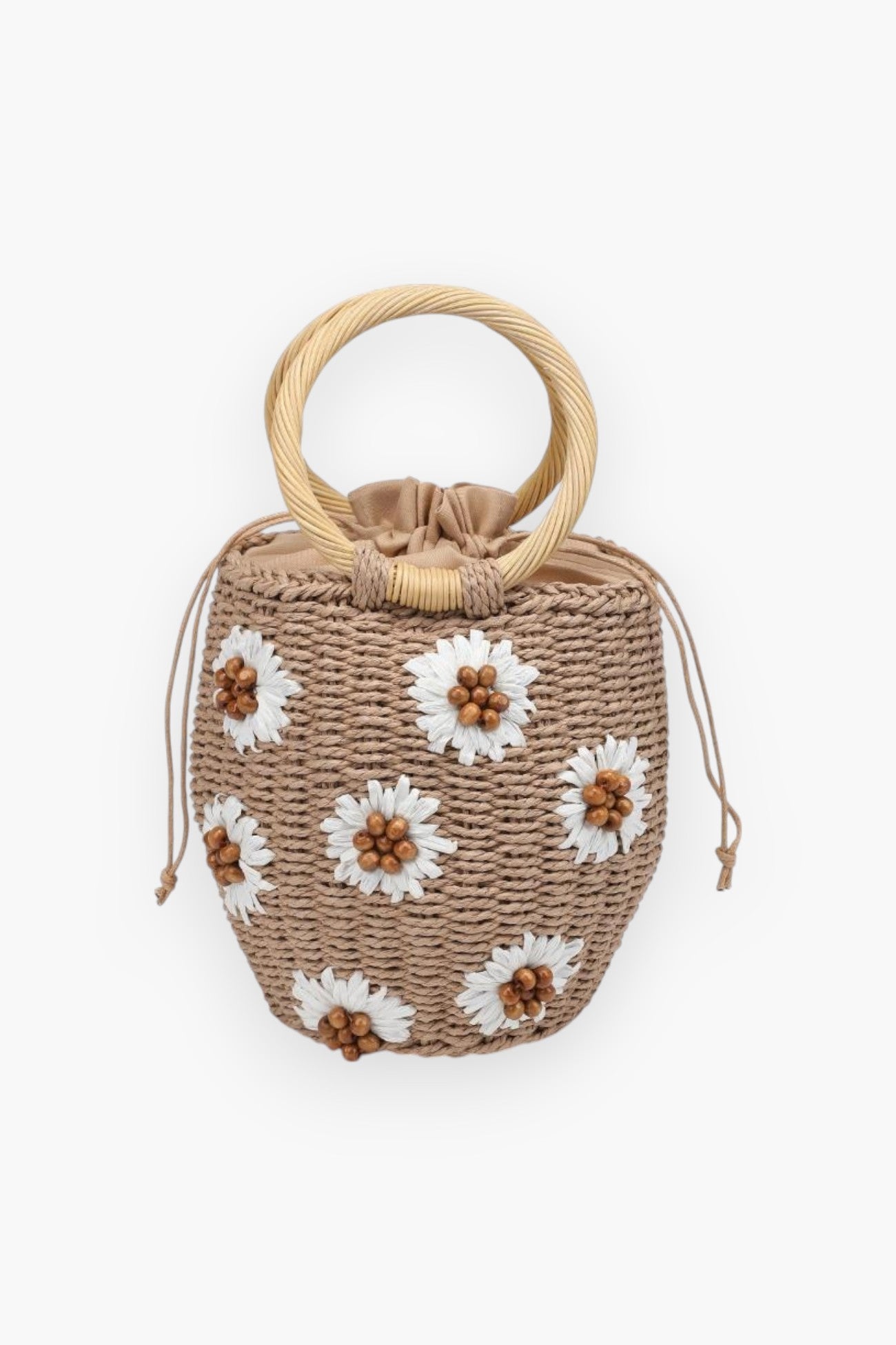 Perfect Picnic Tan Straw Bucket Floral Handbag with white daisy embellishments and circular wicker handles, ideal for summer boho outfits.