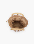 Interior view of the UE Natural Emaline Satchel Purse featuring a spacious tan drawstring pouch for secure and stylish storage.