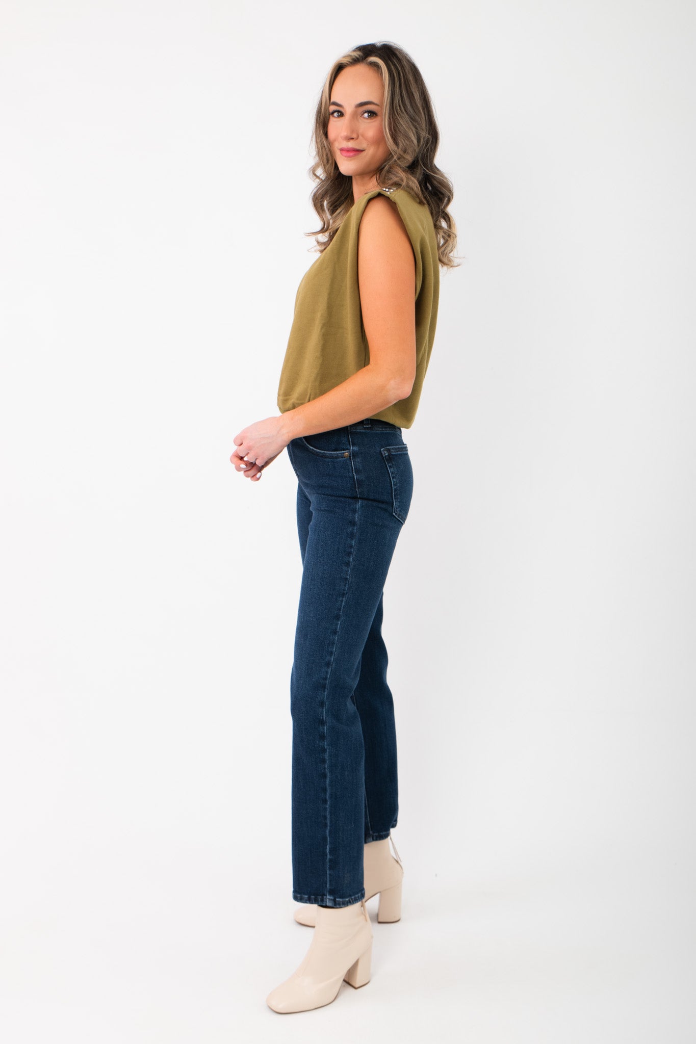 Side profile of Bennett Dark Denim Straight Leg Jean showing flattering high-rise fit and straight leg cut for versatile winter styling.