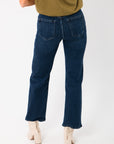 Back view of Bennett Dark Denim Straight Leg Jean highlighting rear pocket design and structured dark wash denim.