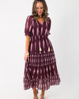 Elegant THML Burgundy & Pink Pattern Maxi Dress featuring elastic cinched waist and flowy midi length, ideal for festive or date night wear.