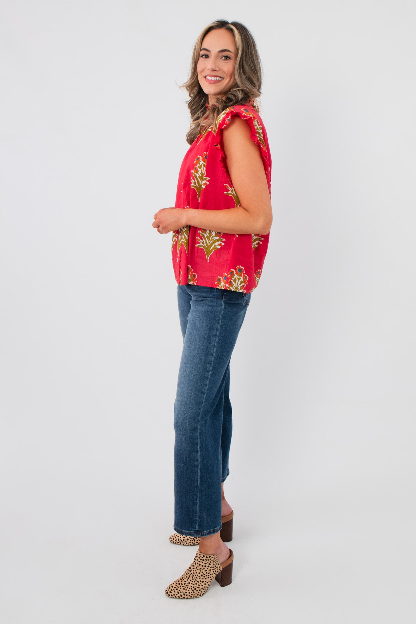 Side profile of THML Magenta Floral Block Print Top showing flutter sleeve detail and relaxed fit, ideal for casual spring outfits.