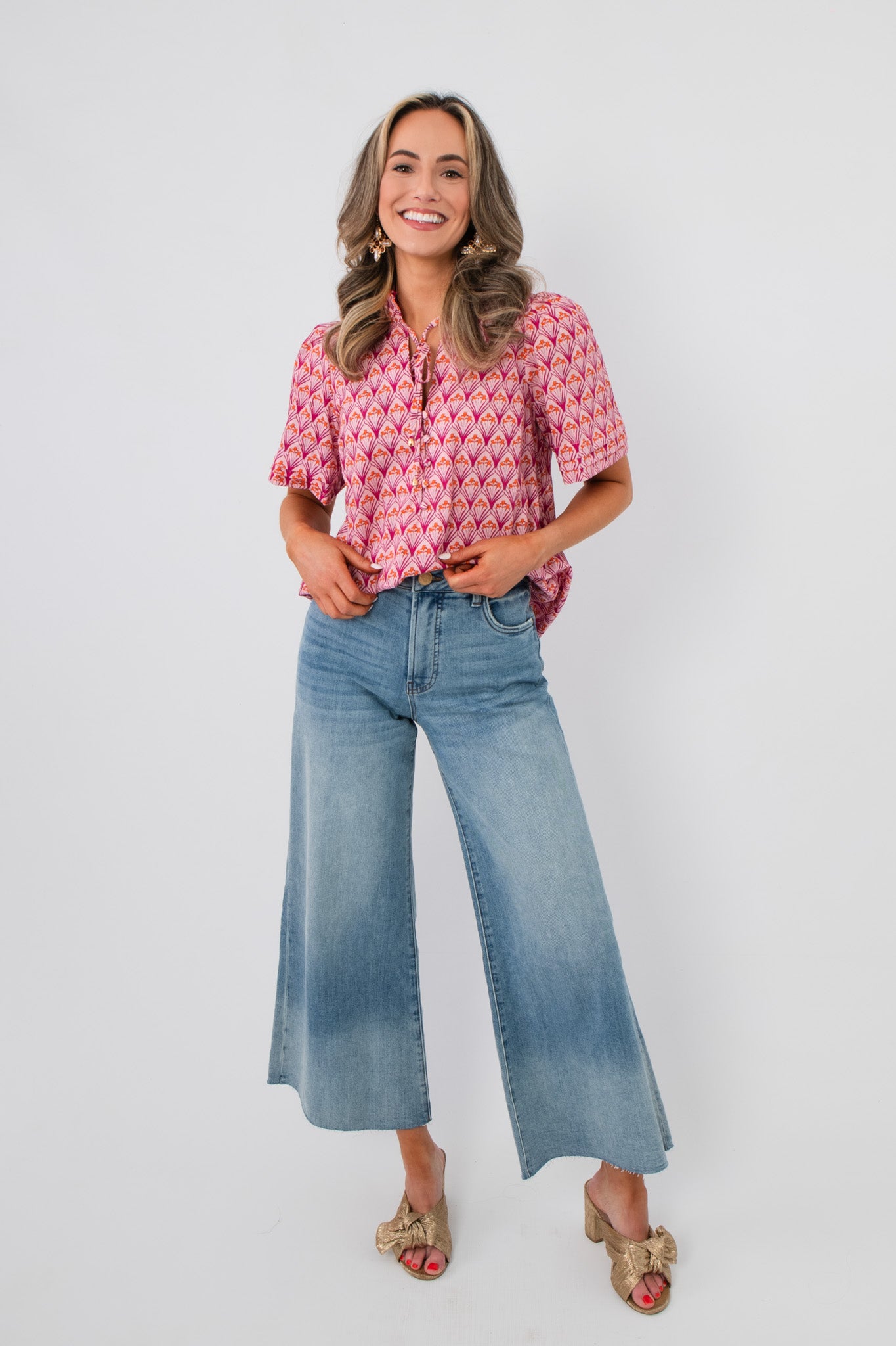 Light wash Kut Generosity Ryan High Rise Super Wide Leg Jean featuring a flattering wide leg and high-rise waist, ideal for casual spring outfits.