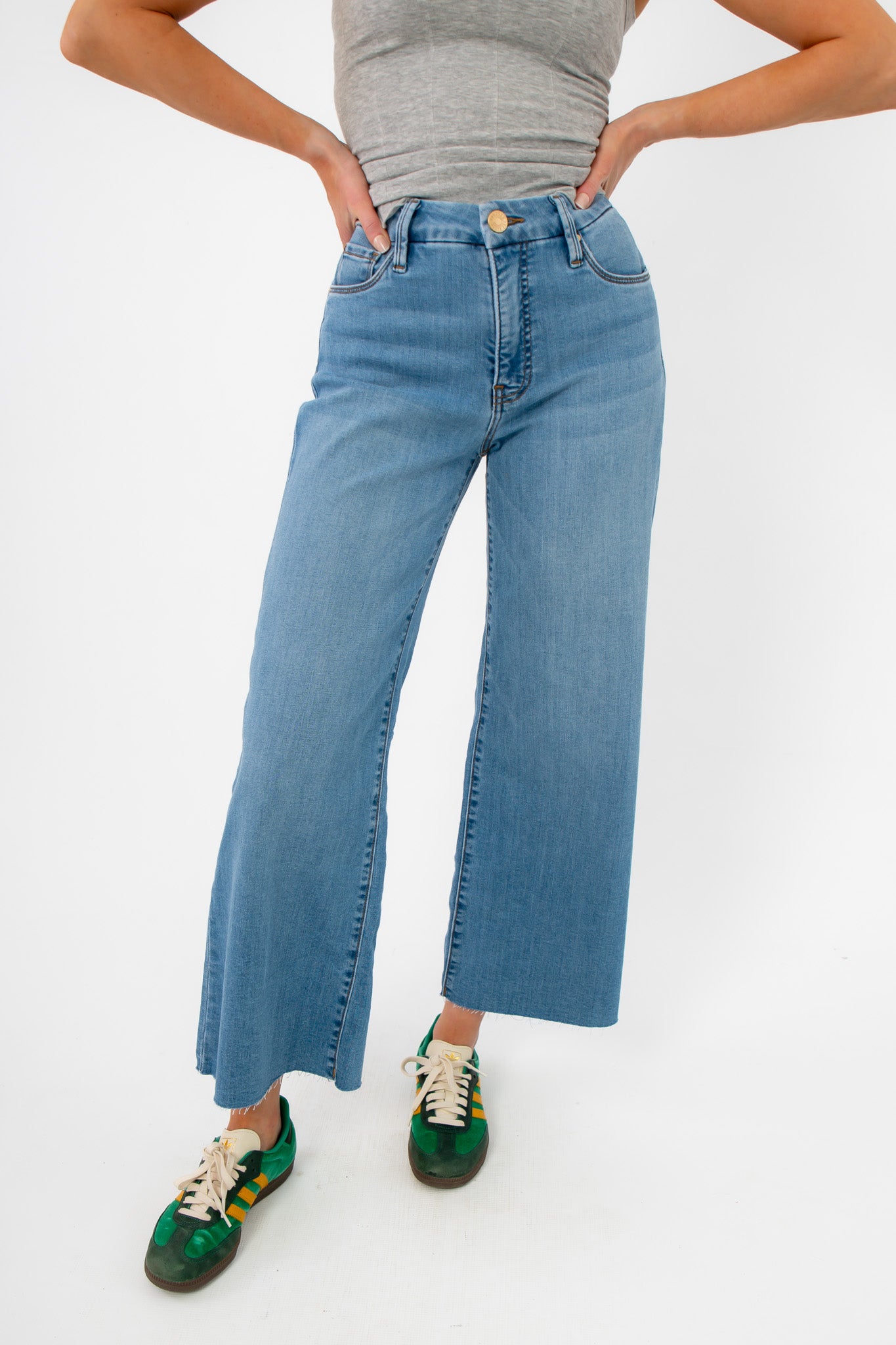 Kut from the Kloth Deference Meg High Rise Jean in light blue denim with wide leg cut and sleek high waist fit, ideal for casual wear.