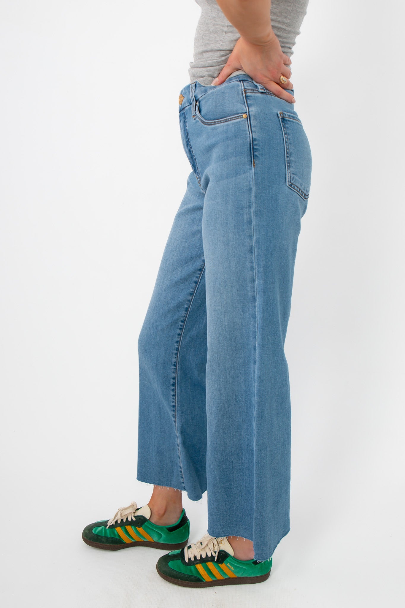 Side view of Kut from the Kloth Deference Meg High Rise Jean highlighting structured seams, high waist, and cropped wide leg silhouette.