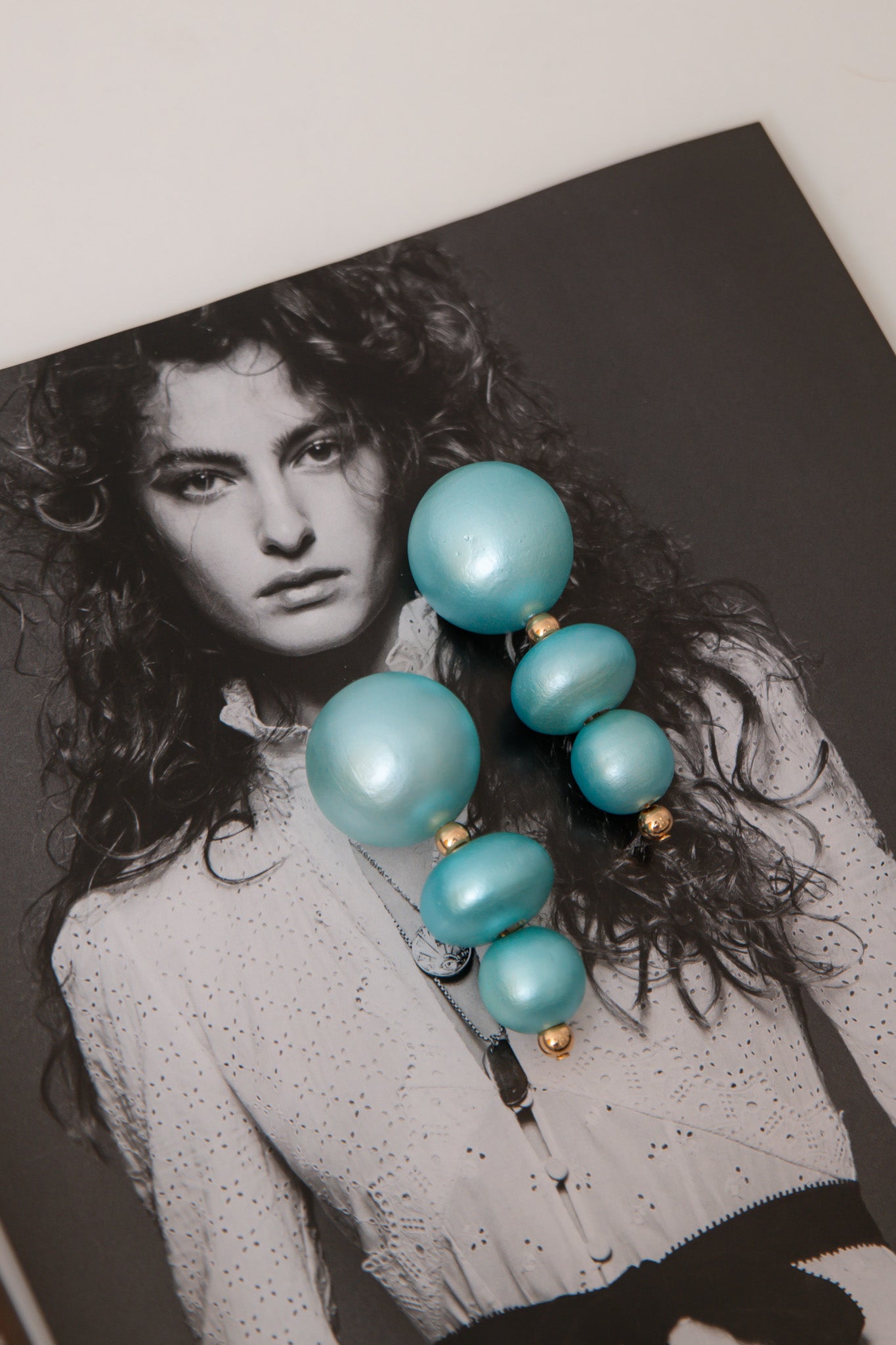 Light Blue Wood Ball Earrings – Lightweight Statement Jewelry featuring stacked round wooden beads in pastel blue with gold accents, ideal for summer.