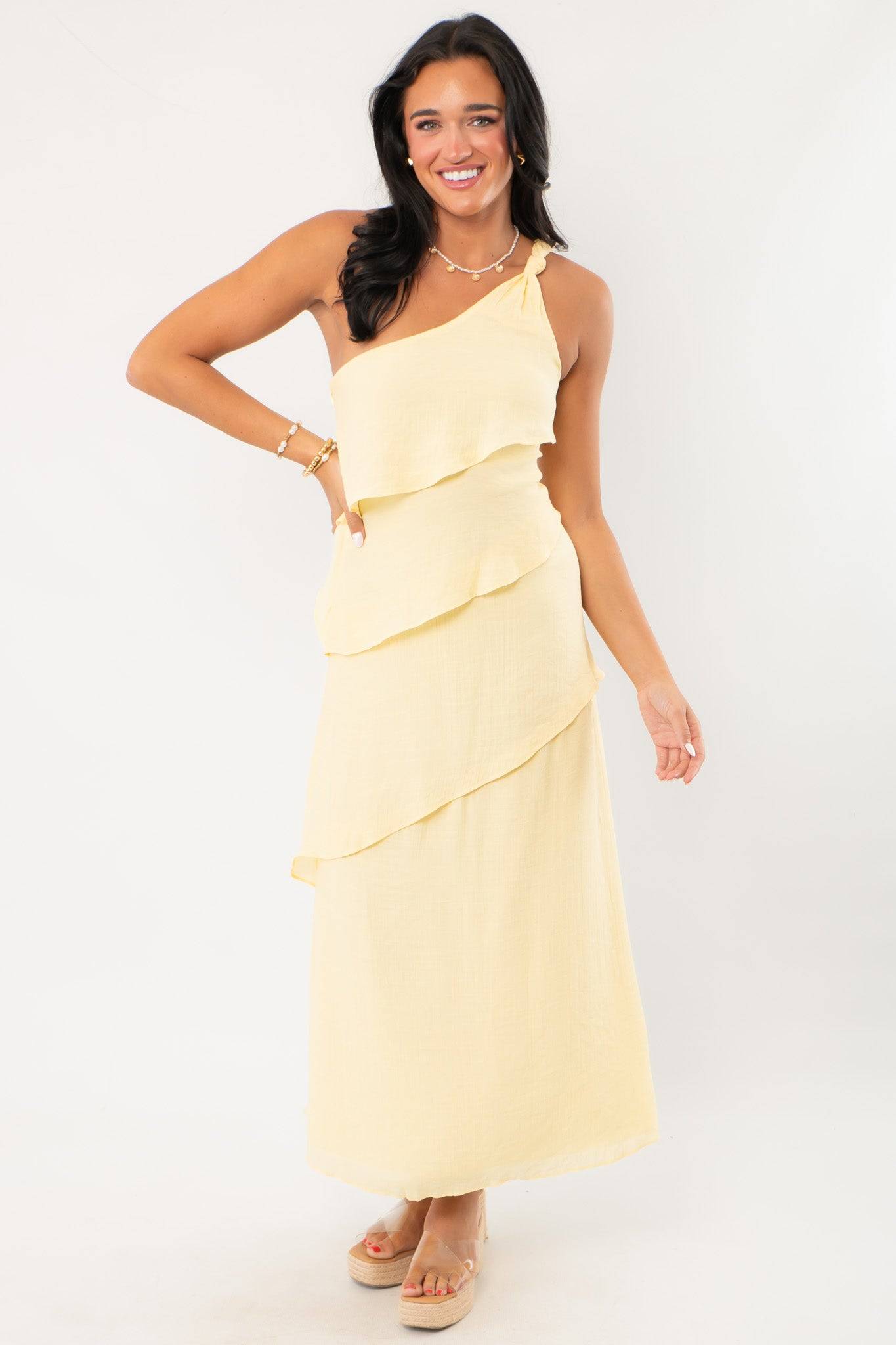 Radiate elegance in our Andie Yellow Layered One Shoulder Maxi Dress featuring tiered ruffles and a flattering asymmetrical neckline.