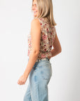 Side view of Take It From Here Floral Sleeveless Vest Top – Vintage Knit Style showing sleeveless cut and relaxed fit for spring layering.