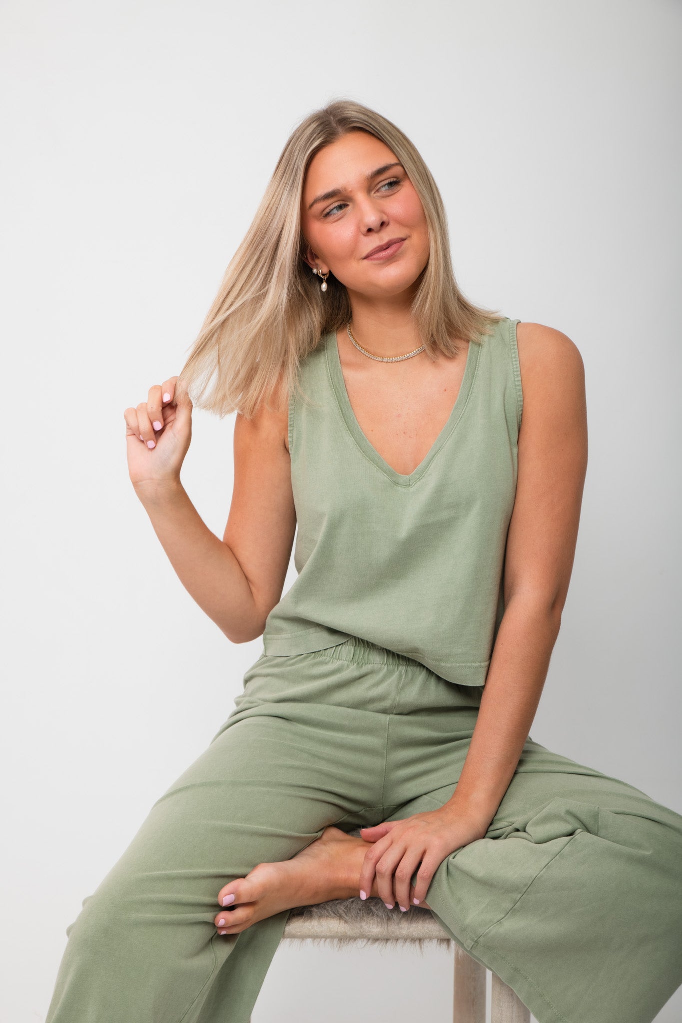 Z Supply Avocado Sloane V-Neck Cotton Jersey Top – Lightweight Tank in soft green with relaxed fit, styled with matching lounge pants.