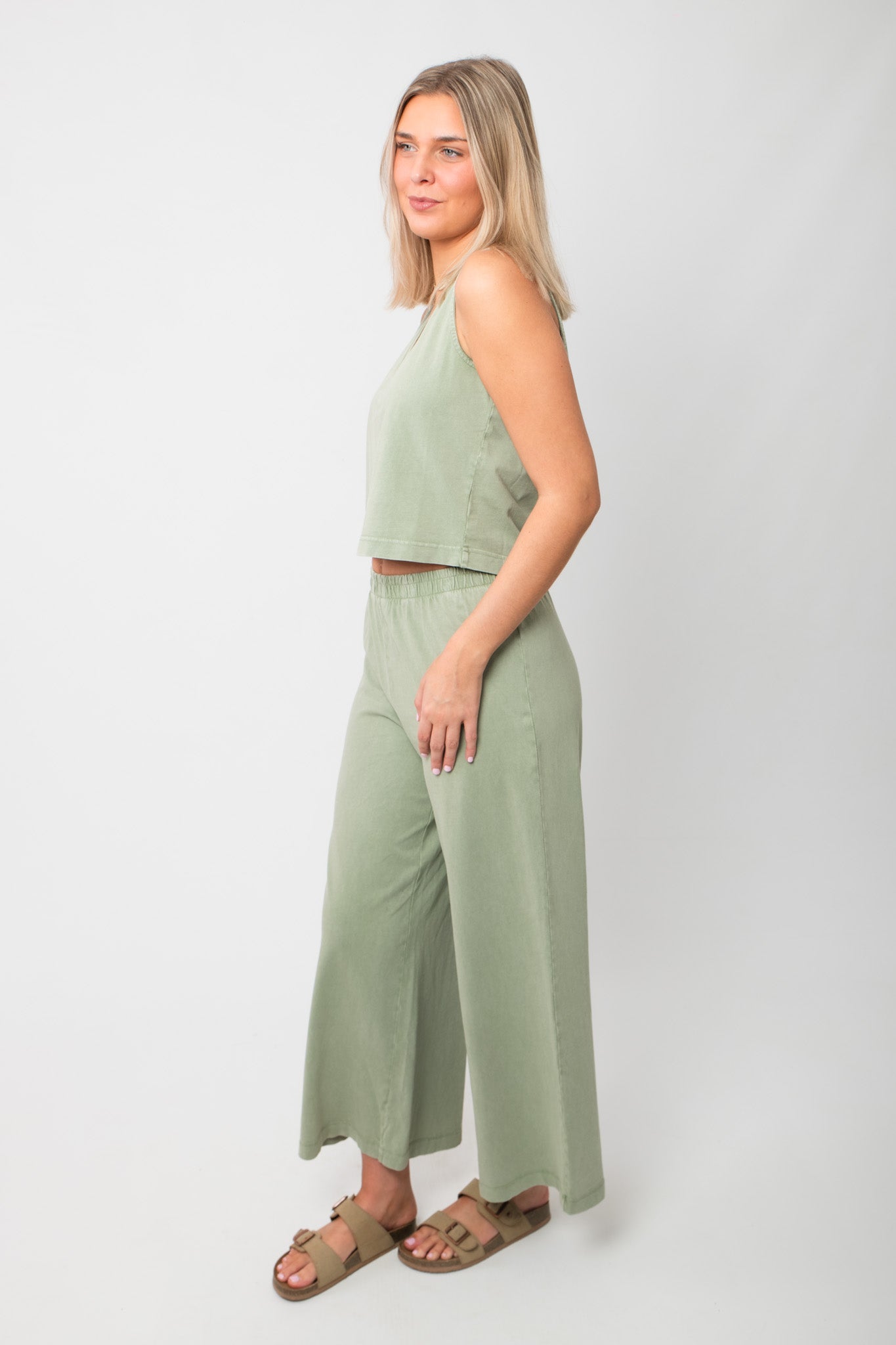 Side view of Z Supply Avocado Scout Jersey Pant showing wide flare leg and lightweight cotton fabric, perfect for lounge or everyday style.