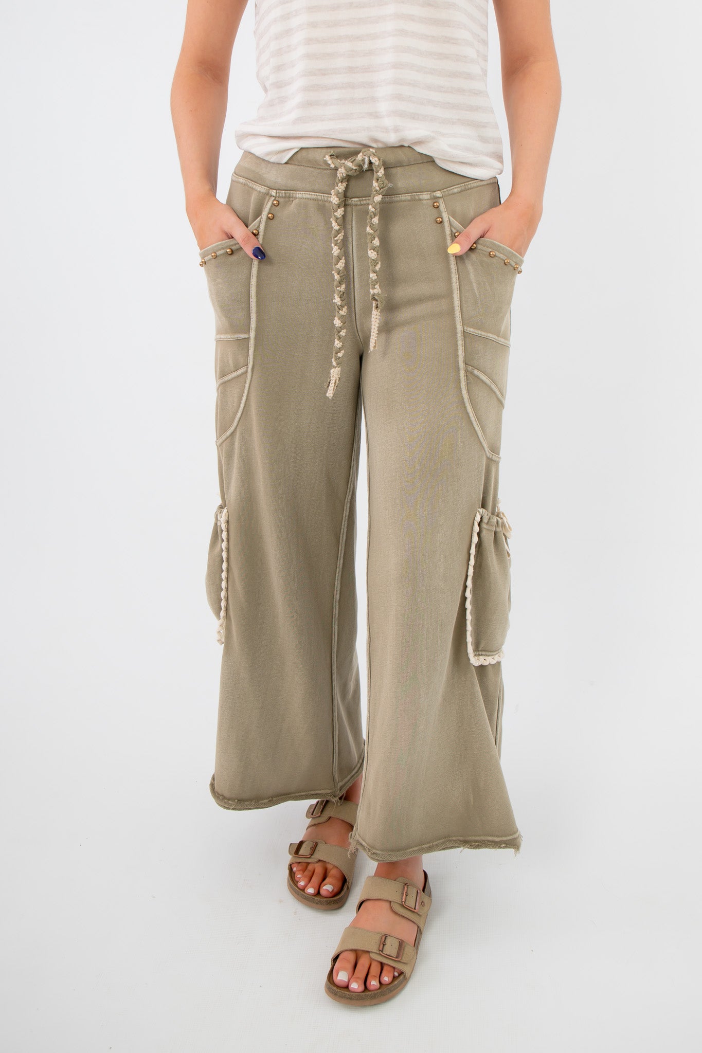 Cactus Blossom Studded Wide Leg Pants – Smokey Sage with braided drawstring waist, front pockets, and boho-style side pouch detailing.