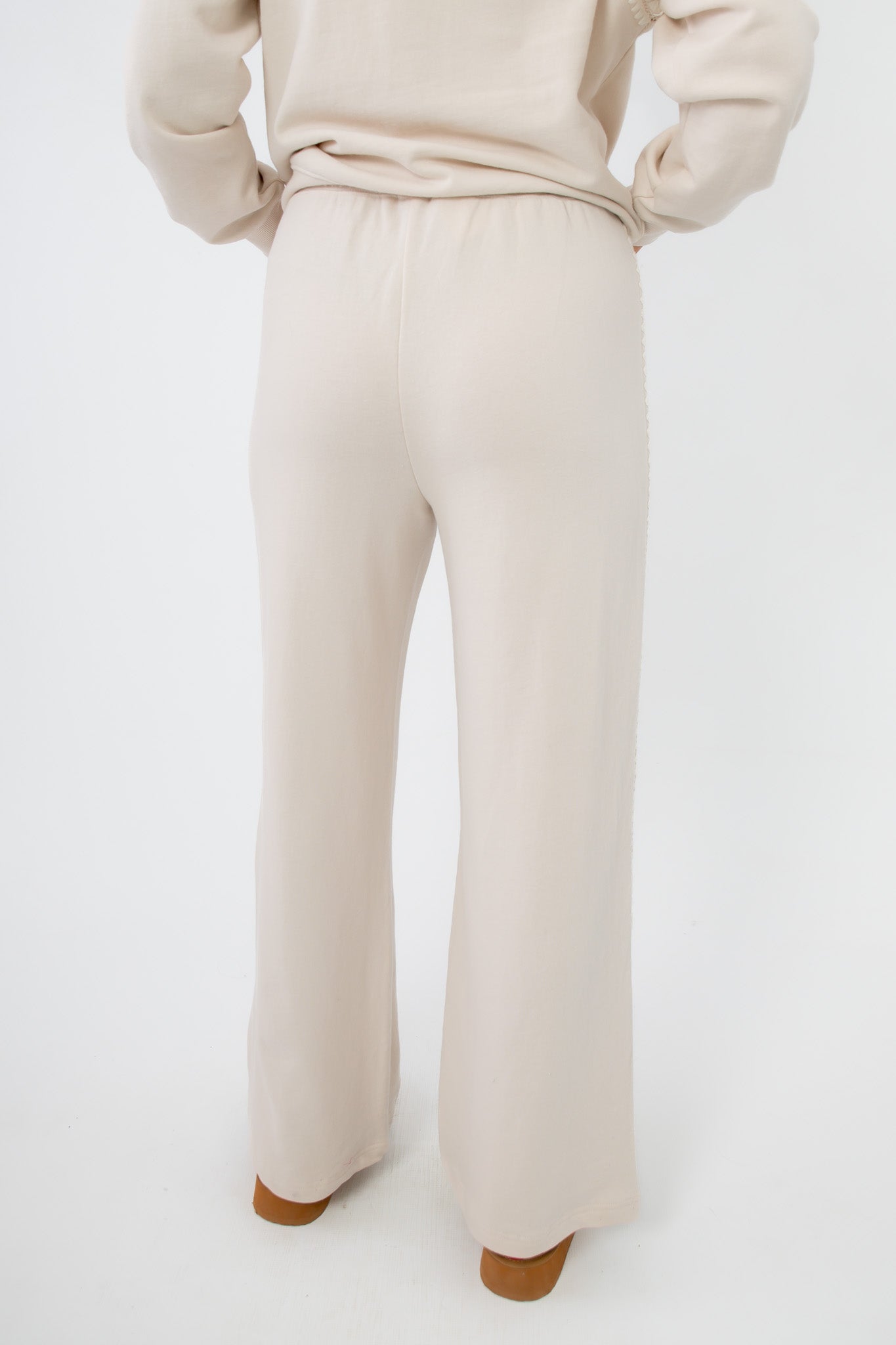 Back view of Z Supply Crystal Take All Sweatpant featuring elastic waistband and loose fit for relaxed, casual wear.