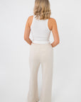 Back view of Free People Clean Ivory Seamless Modal Tank highlighting racerback cut and smooth, seamless design for a sleek look.
