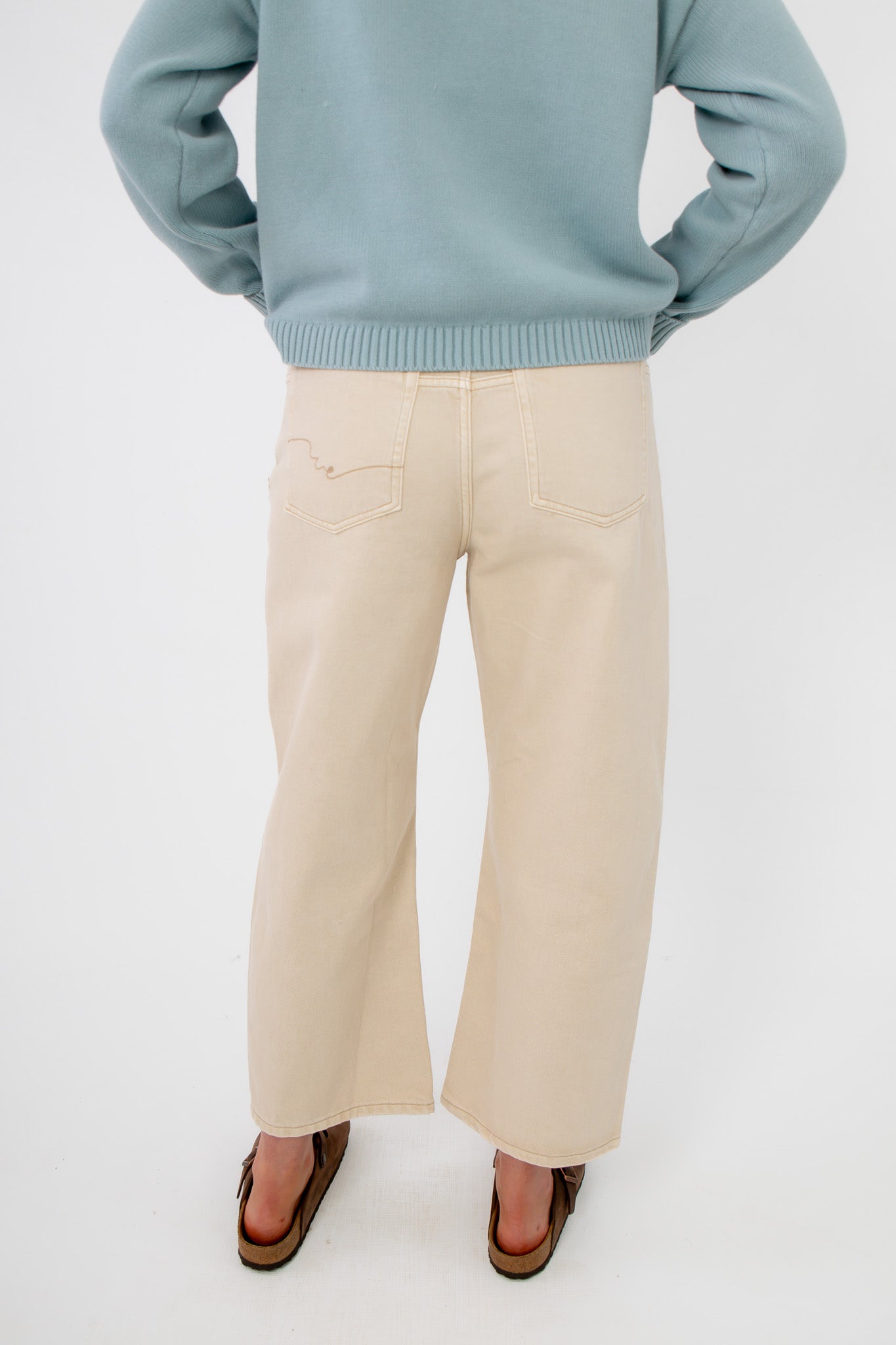 Back view of Free People Deep Trance Boyfriend Jean in casual khaki featuring classic pockets and loose boyfriend-style silhouette.